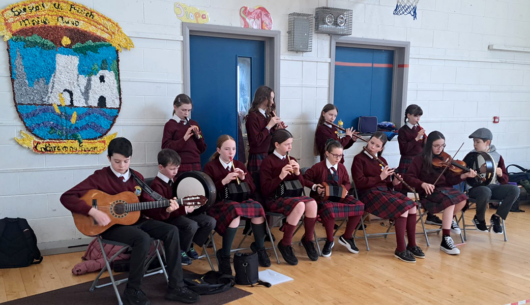 Students playing instruments for music class