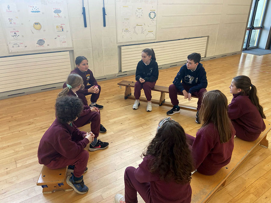 Student council members sitting at a meeting