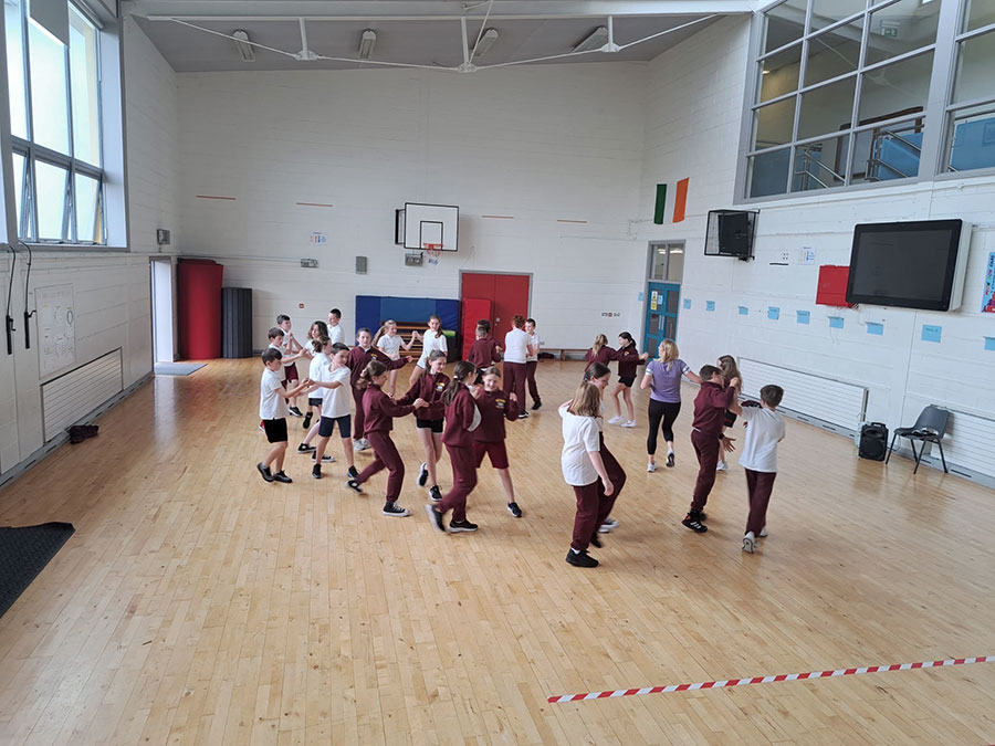 Students playing sports in PE